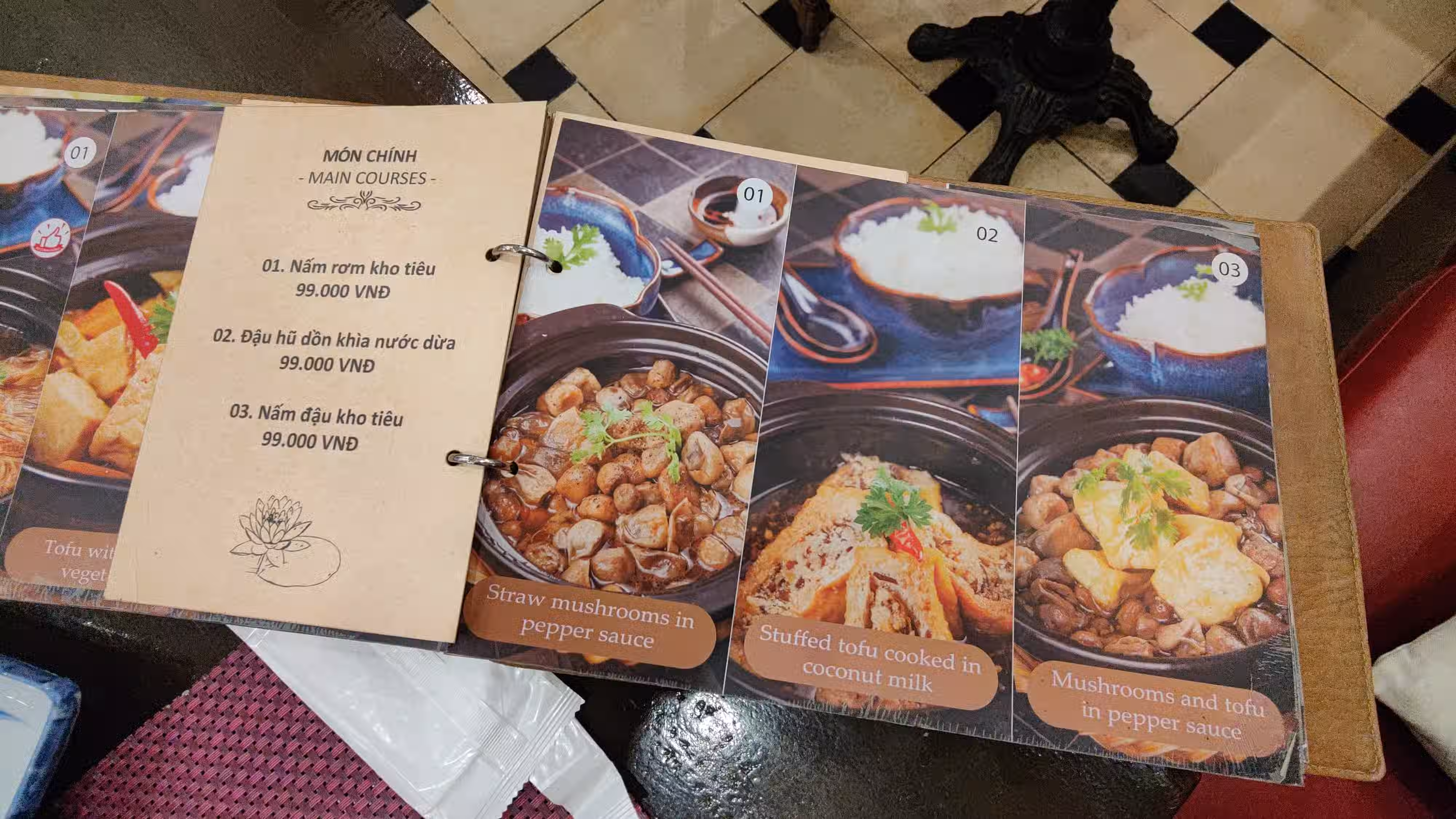 Menu from a restaurant in Ho Chi Minh City with detailed description of the food. Photo by Ravi Dwivedi, released under CC-BY-SA 4.0.